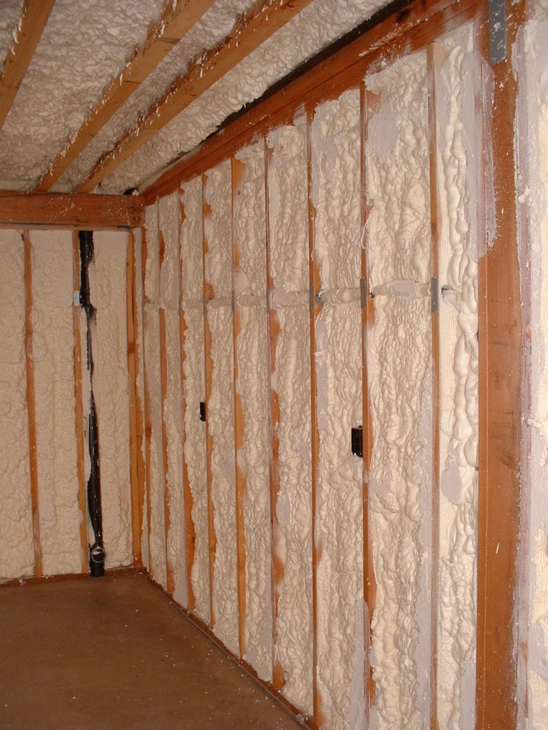 Spray Foam Insulation visible during a basement upgrade
