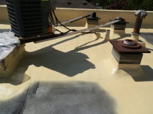 Lapolla roofing foam applied to create maximum water drainage.
